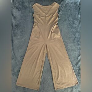 Stretchy tan/khaki wide leg jumpsuit with a flattering fit
